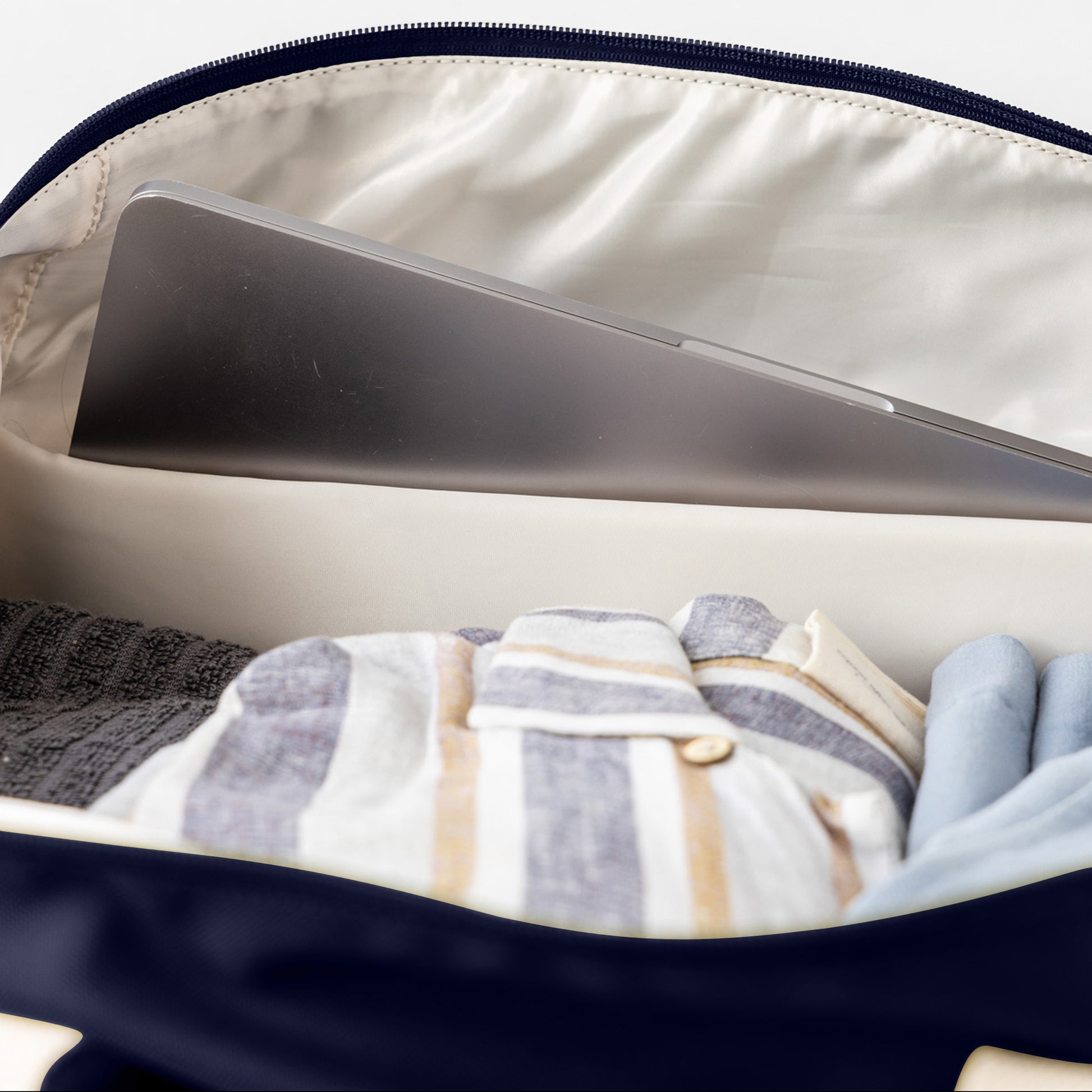 Navy duffle bag internal padded pocket