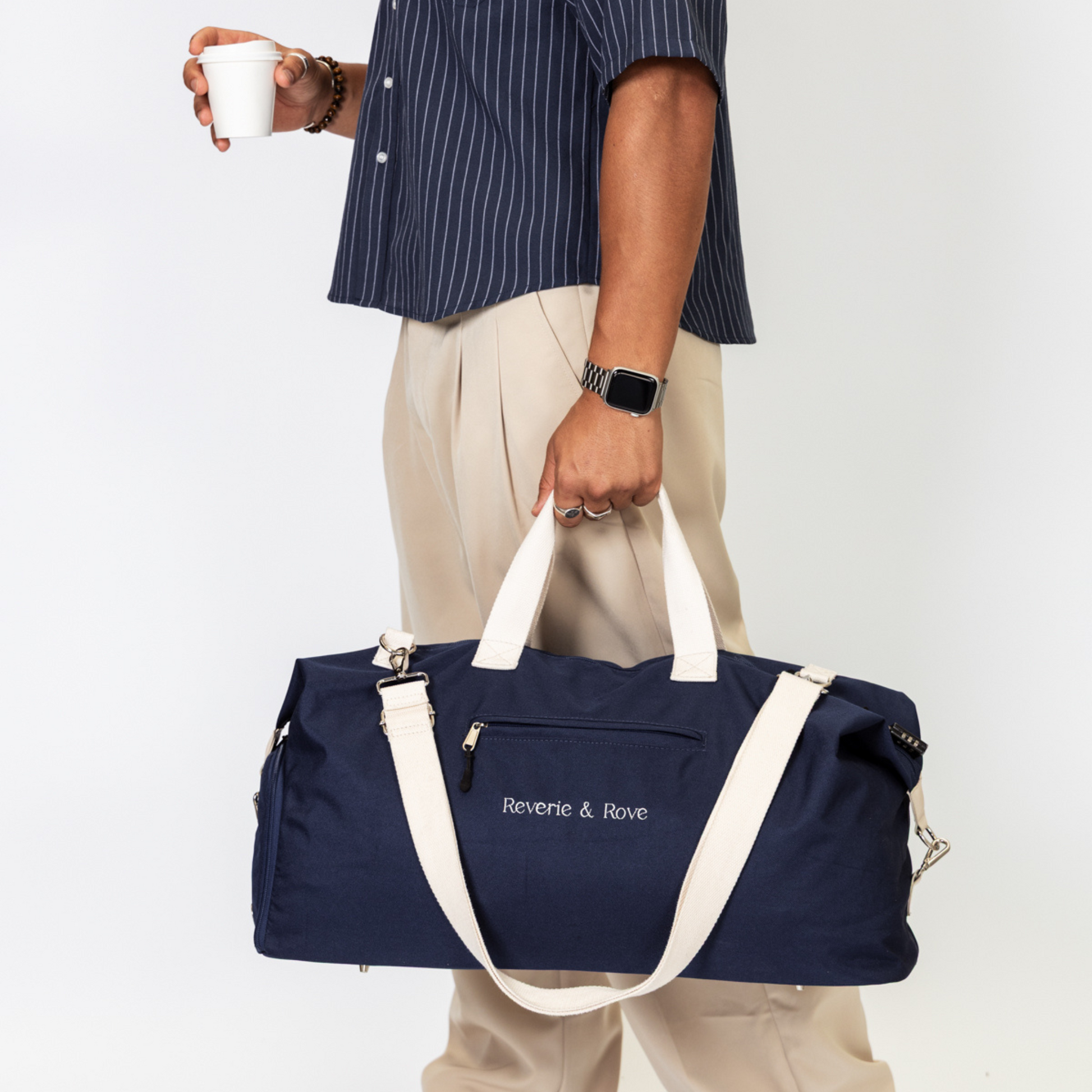 Navy duffle bag packed for travel in transit