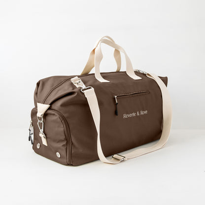 Chocolate duffle bag front left showing shoe section