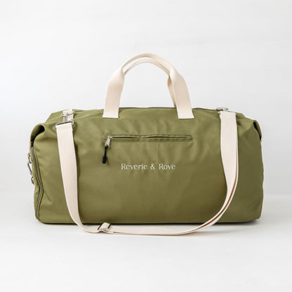 Front view of duffle bag with quick access pockets 