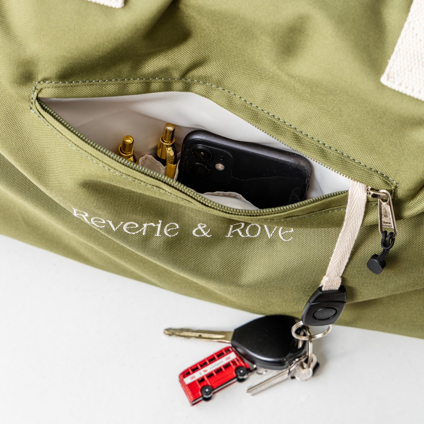 Front quick access pocket with key tag